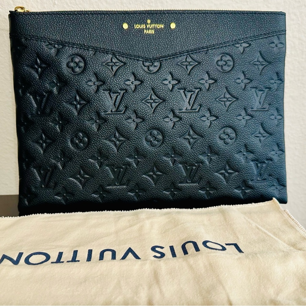 Louis Vuitton daily pouch monogram empreinte leather